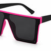 Black flat top sunglasses with pink detail