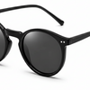 Black round sunglasses with polarized lenses, stylish women's sunwear for UV protection