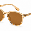 Gold-framed sunglasses with brown lenses on a white background