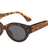 Stylish women's cat-eye sunglasses with orange tortoise pattern and UV protection lenses