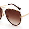 Tortoiseshell aviator sunglasses with gold frame and gradient brown lenses, stylish women's UV protection shades