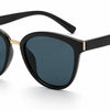 black and gold cats eye sunglasses