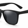 Black wayfarer sunglasses with textured temples, UV protection and polarization for women