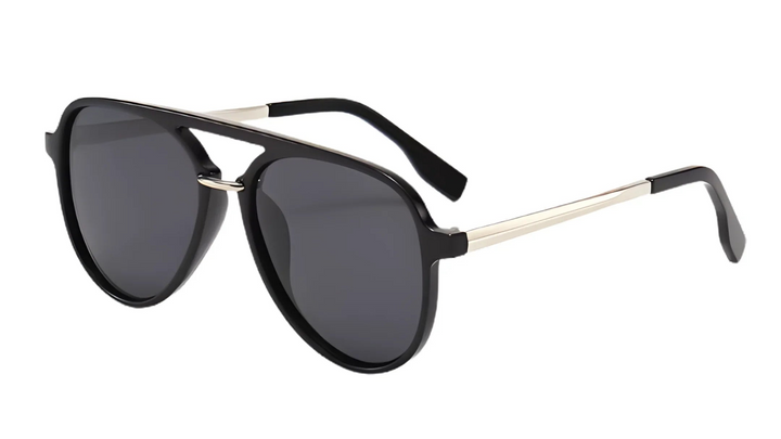 Stylish black aviator sunglasses with gold accents, UV protection, and polarized lenses for women.