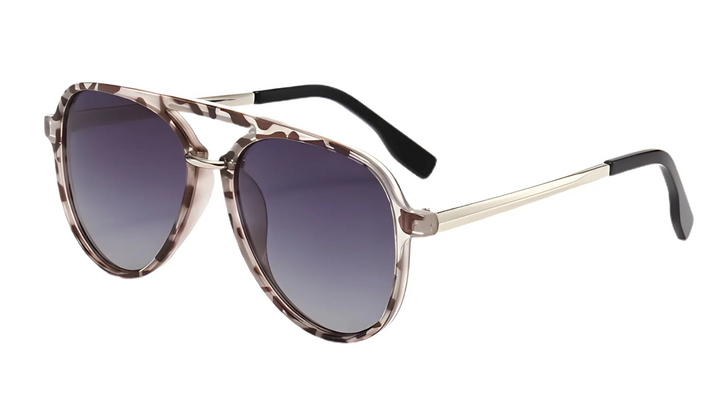 Stylish women's aviator sunglasses with gradient lenses and tortoiseshell frame, UV protection