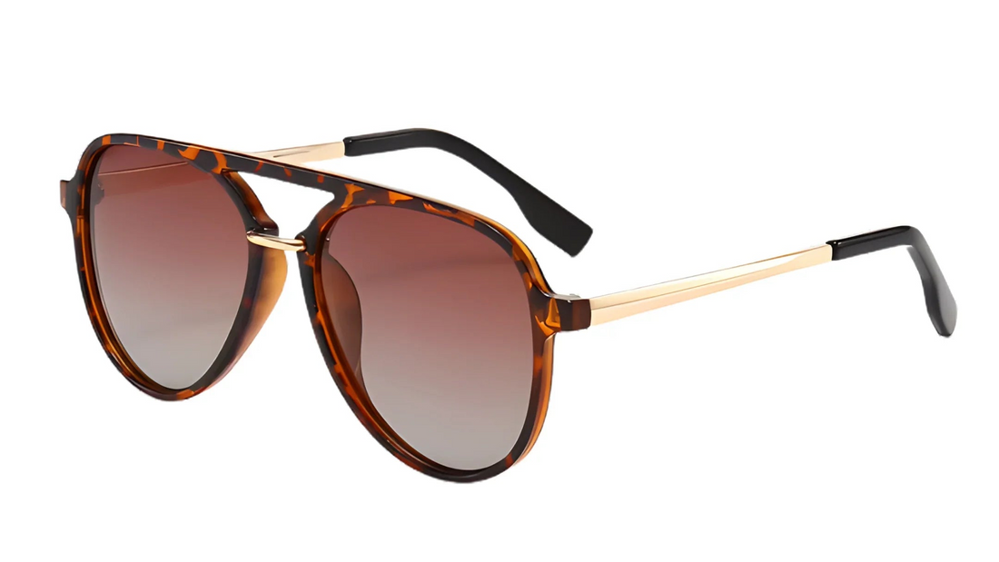 Tortoiseshell aviator sunglasses with gradient lenses and gold accents, stylish women's UV protection shades