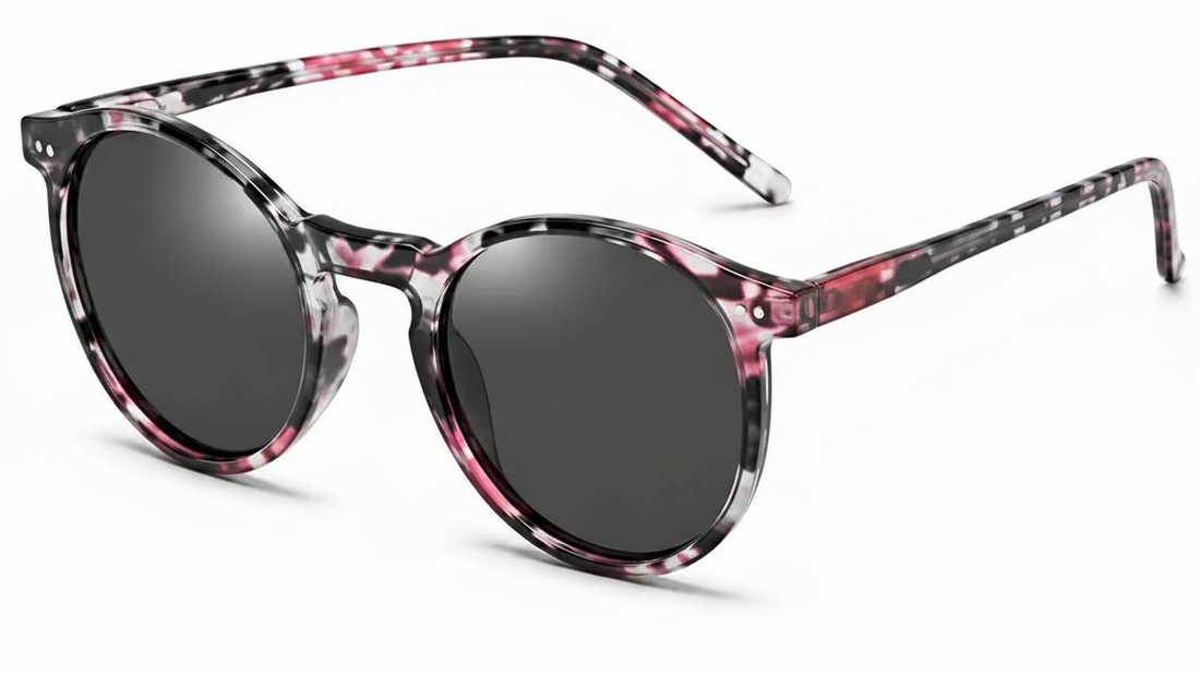 Stylish round sunglasses with pink and black marbled frames, polarized dark lenses for UV protection