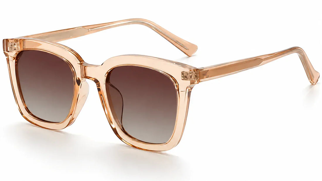 Stylish women's sunglasses with clear peach frames and gradient brown lenses, UV protection