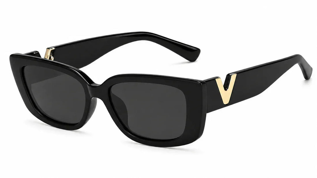 Stylish black cat-eye sunglasses with gold V accent, UV protection, polarized lenses for women