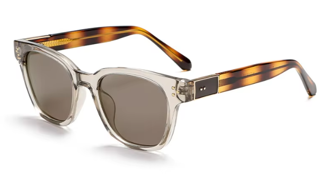 Clear acetate sunglasses with brown-tinted lenses and tortoiseshell temples