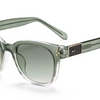 Oversized square sunglasses with a translucent smoky green acetate frame and gradient gray-green lenses, featuring gold-tone metal rivets and a dark brown rectangular accent on the temple.