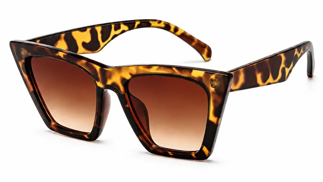 Tortoiseshell cat-eye sunglasses with brown gradient lenses, stylish women's UV protection eyewear