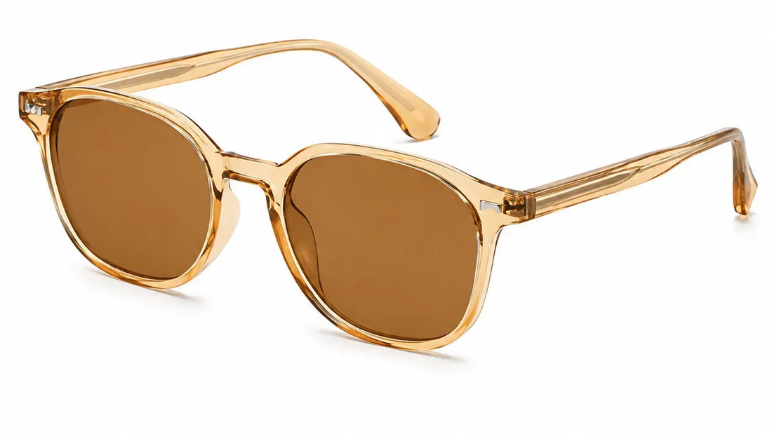 Stylish amber-tinted sunglasses with translucent gold frames, UV protection and polarization for women.