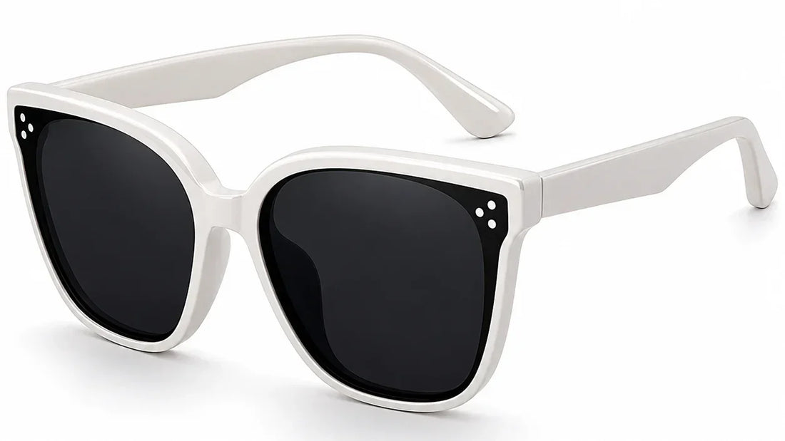 White cat-eye sunglasses with black lenses and decorative dots, stylish women's UV protection shades