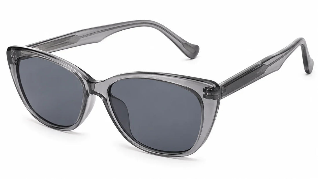Stylish cat-eye sunglasses with gray tinted lenses and translucent frames, perfect for women's fashion.