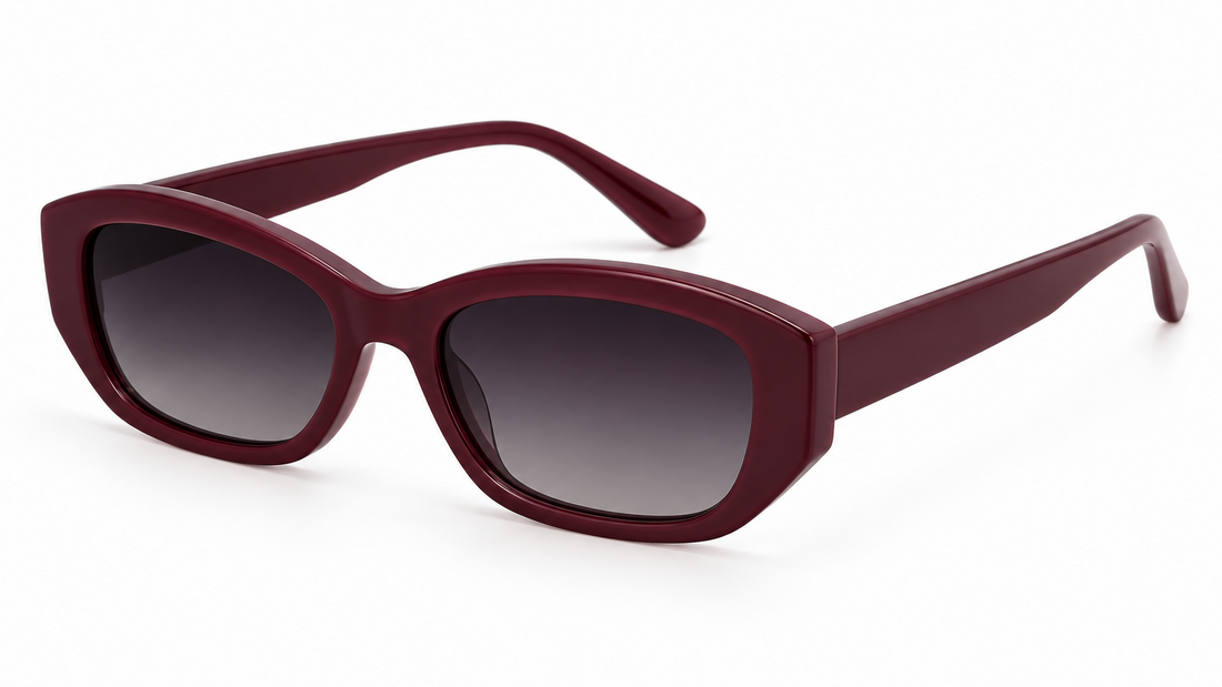 Fox Shades Brittany burgundy rectangular sunglasses shown at an angle, with open arms and dark gradient lenses on a white background.