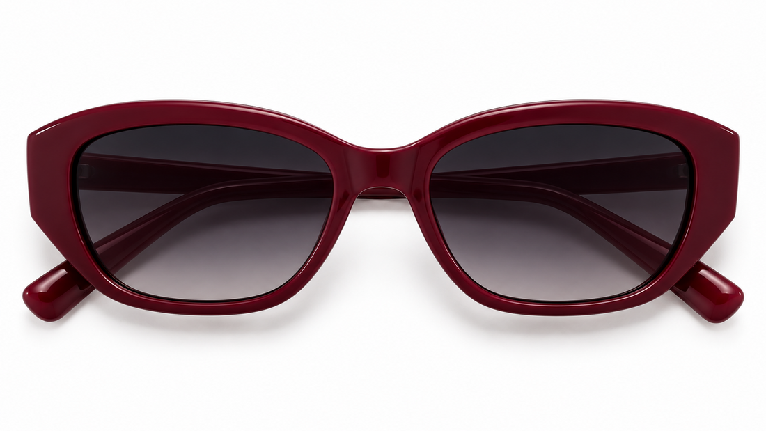 Front view of Fox Shades Brittany burgundy rectangular sunglasses, with folded arms visible behind dark gradient lenses on a white background.