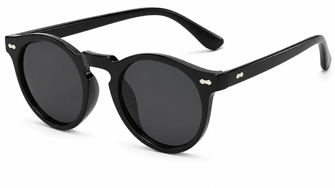 Black round sunglasses with dark lenses and silver accents, stylish women's sunwear with UV protection