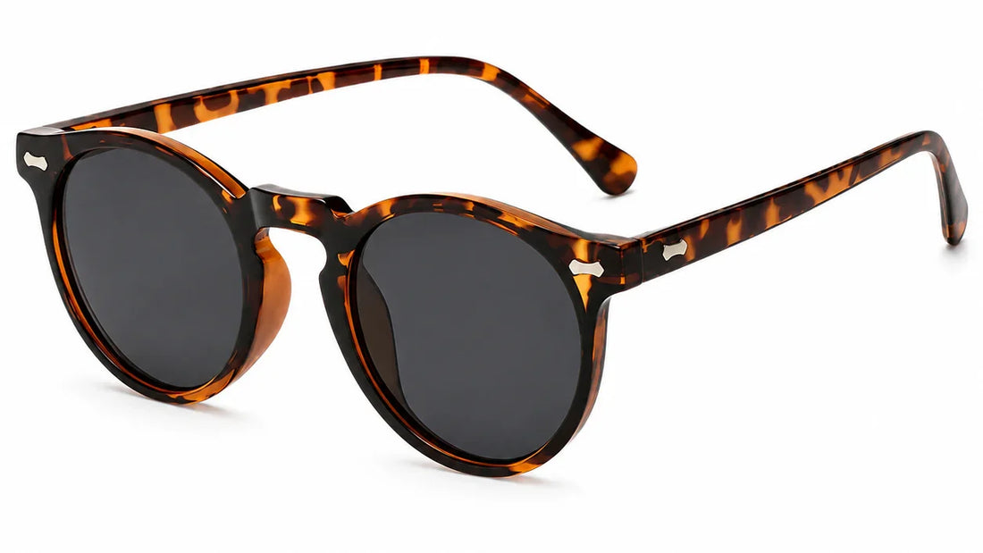 Tortoiseshell round sunglasses with dark lenses, stylish women's UV protection eyewear