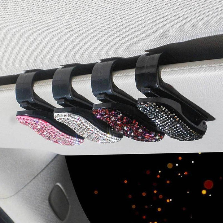 Sparkly rhinestone car visor clips in pink, silver, red, and black for stylish sunglass storage