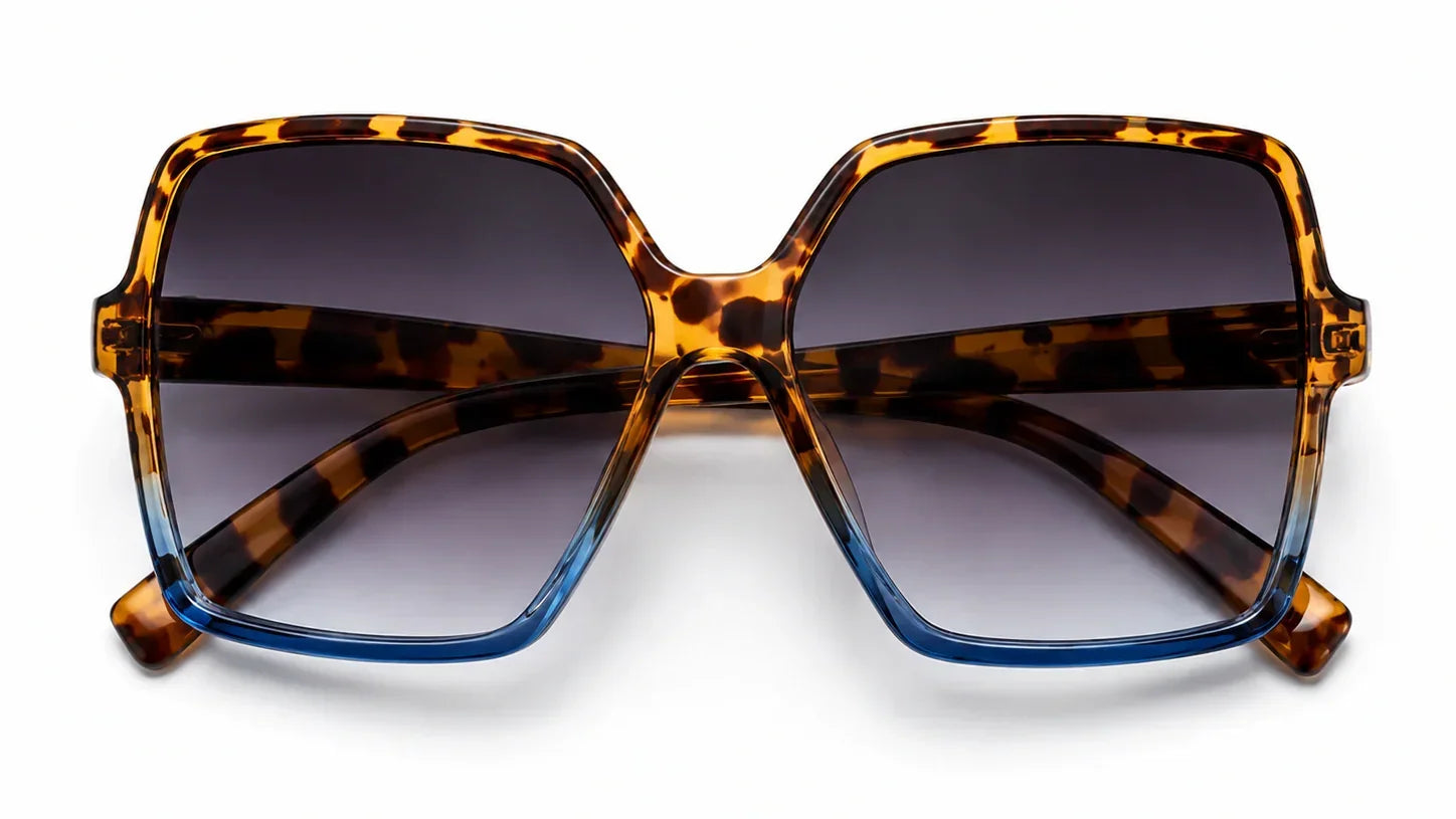 Tortoiseshell oversized sunglasses with blue accents, UV protection, stylish women's fashion frames