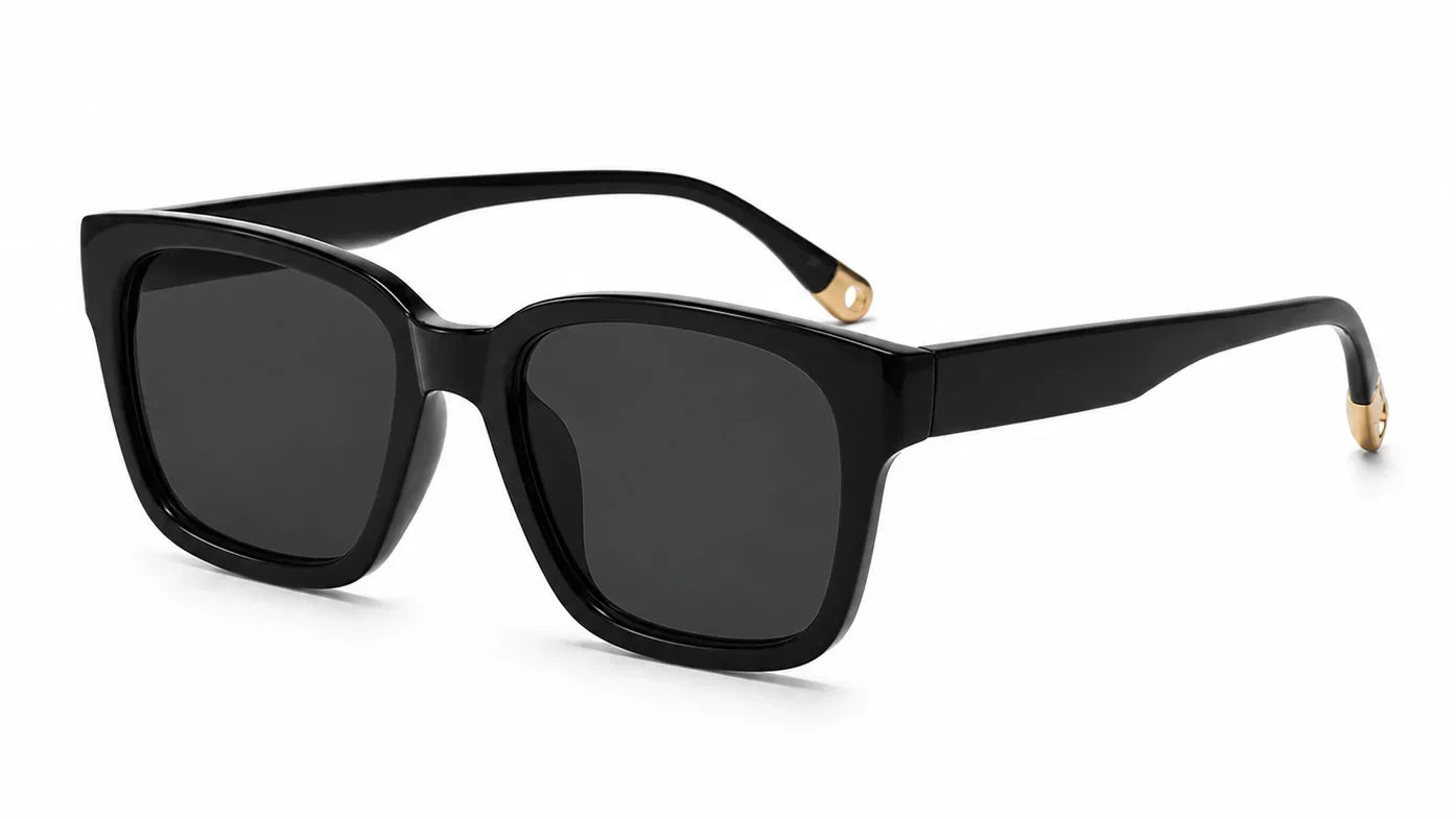 Black square sunglasses by Fox Shades with a glossy black frame, dark smoke lenses, wide arms, and gold-toned temple tips