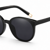 black ladies cat eye sunglasses with gold arm trim