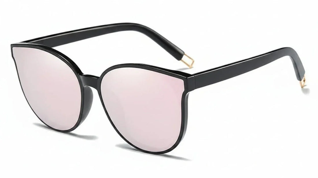 Stylish women's cat-eye sunglasses with pink mirrored lenses and black frames, UV protection